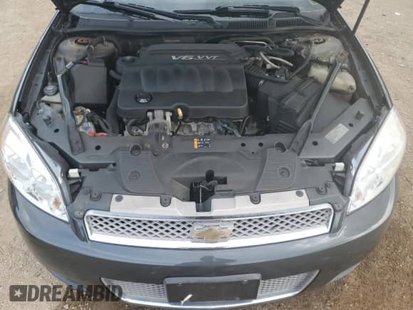 2012 Chevrolet Impala LT Retail with VIN 2G1WB5E32C1265590, listed as a Copart auction lot 82126795 with 112,755 mi miles and Salvage title. Bid and sale history available at DreamBid. Image 11.