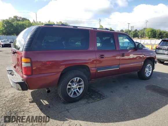 2001 Chevrolet Suburban LT with VIN 1GNFK16T71J254772, listed as a Copart auction lot 71545135 with 197,427 mi miles and Salvage title. Bid and sale history available at DreamBid. Image 3.