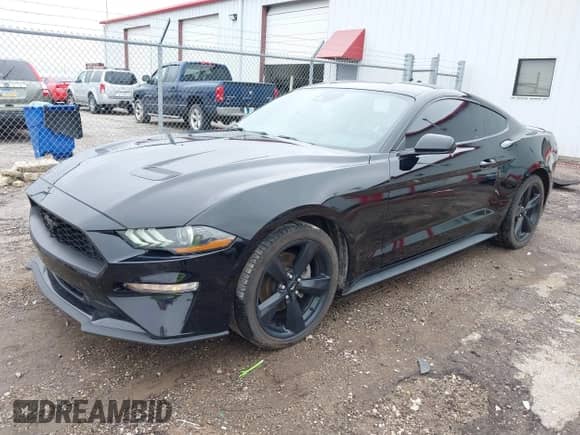 2021 Ford Mustang EcoBoost z VIN 1FA6P8TH1M5139106, wystawiony jako IAAI lot #43283129 z przebiegiem 71 223 mil mil oraz . Historia ofert i sprzedaży dostępna na DreamBid. Obrazek 17.
