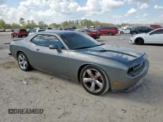 2012 Dodge Challenger R/T Plus z VIN 2C3CDYBTXCH294325, wystawiony jako Copart lot #81279755 z przebiegiem 160 740 mil mil oraz Szkoda całkowita • Salvage title. Historia ofert i sprzedaży dostępna na DreamBid. Obrazek 4.