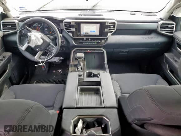 2023 Toyota Tundra SR5 with VIN 5TFLA5DAXPX063117, listed as a Copart auction lot 50590875 with 60,409 mi miles and Salvage title. Bid and sale history available at DreamBid. Image 8.