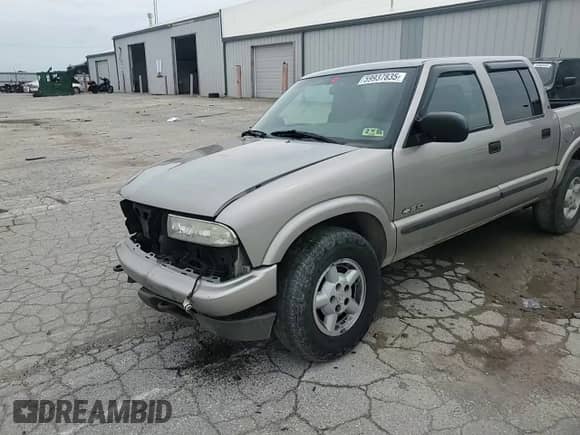 2004 Chevrolet S-10 LS z VIN 1GCDT13X64K143889, wystawiony jako Copart lot #59937835 z przebiegiem 142 274 mil mil oraz Szkoda całkowita • Salvage title. Historia ofert i sprzedaży dostępna na DreamBid. Obrazek 13.