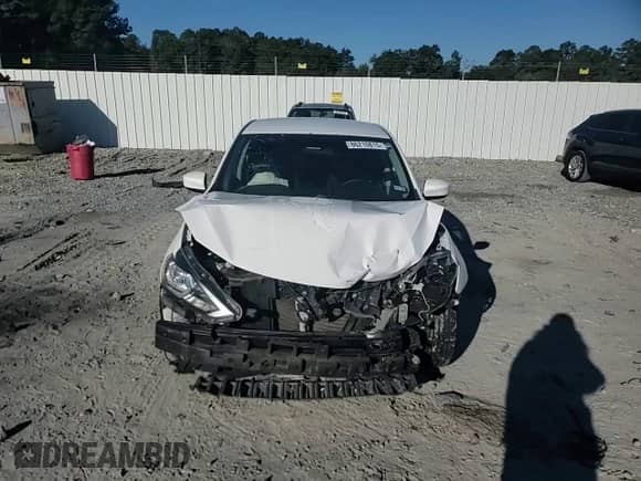 2017 Nissan Sentra S z VIN 3N1AB7AP1HY293799, wystawiony jako Copart lot #86210815 z przebiegiem 109 796 mil mil oraz Szkoda całkowita • Salvage title. Historia ofert i sprzedaży dostępna na DreamBid. Obrazek 14.