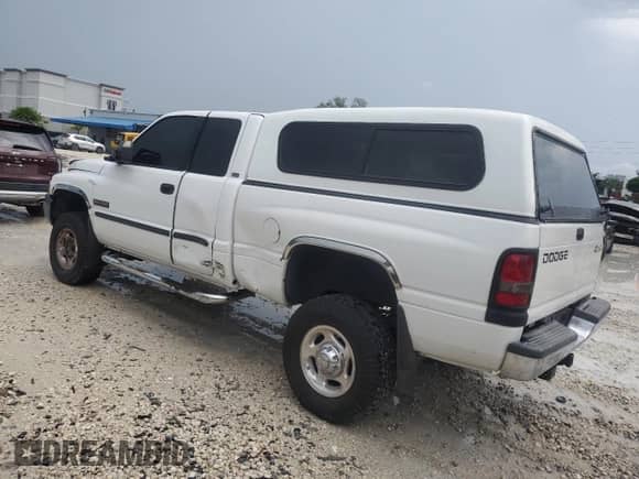 2002 Dodge 2500 with VIN 3B7KF23622M200574, listed as a Copart auction lot 70182175 with 239,431 mi miles and Salvage title. Bid and sale history available at DreamBid. Image 2.