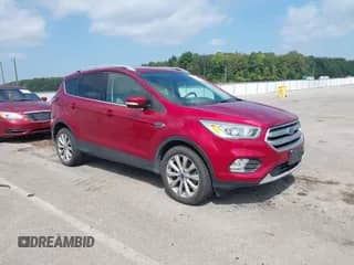 2017 Ford Escape Titanium с VIN 1FMCU9JD7HUB60495, выставлен на аукционе IAAI как лот 43137414 с пробегом 98 068 миль миль и . История ставок и продаж доступна на DreamBid. Изображение 1.