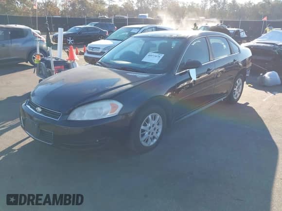 2011 Chevrolet Impala Police Police with VIN 2G1WD5EM6B1251953, listed as a IAAI auction lot 40972078 with 106,935 mi miles and . Bid and sale history available at DreamBid. Image 2.