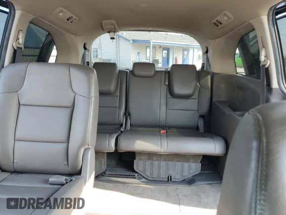 2013 Honda Odyssey EX-L с VIN 5FNRL5H68DB054612, выставлен на аукционе Copart как лот 71016025 с пробегом 180 538 миль миль и Списание • Salvage title. История ставок и продаж доступна на DreamBid. Изображение 10.
