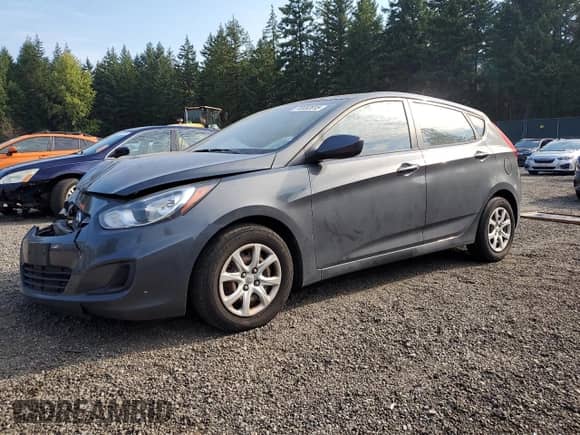 2012 Hyundai Accent GS with VIN KMHCT5AE7CU011159, listed as a Copart auction lot 70052815 with 156,055 mi miles and Salvage title. Bid and sale history available at DreamBid. Image 1.