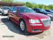 2014 Chrysler 300 C with VIN 2C3CCAEG5EH372859, listed as a IAAI auction lot 42004993 with 204,587 mi miles and . Bid and sale history available at DreamBid. Image 1.