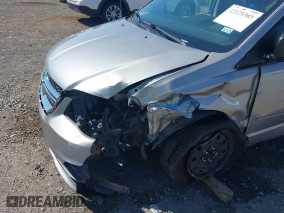 2015 Dodge Grand Caravan SE Plus with VIN 2C4RDGBGXFR540615, listed as a IAAI auction lot 43135303 with 77,597 mi miles and . Bid and sale history available at DreamBid. Image 6.