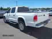 2002 Dodge Dakota Sport с VIN 1B7HG38N42S709487, выставлен на аукционе IAAI как лот 42820462 с пробегом 165 695 миль миль и . История ставок и продаж доступна на DreamBid. Изображение 3.