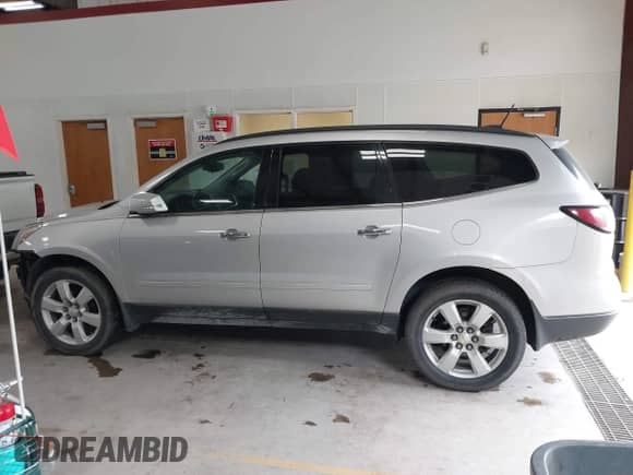 2016 Chevrolet Traverse LT with VIN 1GNKVGKD9GJ161073, listed as a IAAI auction lot 43025978 with 143,832 mi miles and . Bid and sale history available at DreamBid. Image 14.