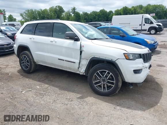 2021 Jeep Grand Cherokee Trailhawk z VIN 1C4RJFLG7MC588578, wystawiony jako IAAI lot #42748836 z przebiegiem 96 261 mil mil oraz . Historia ofert i sprzedaży dostępna na DreamBid. Obrazek 1.