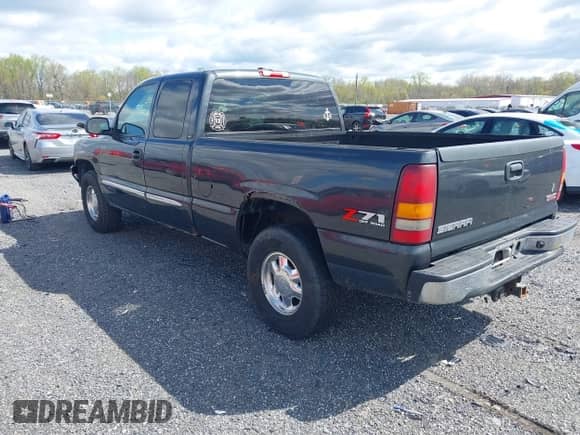 2003 GMC Sierra 1500 SLT z VIN 2GTEK19T131325073, wystawiony jako IAAI lot #42018525 z przebiegiem 338 659 mil mil oraz . Historia ofert i sprzedaży dostępna na DreamBid. Obrazek 3.