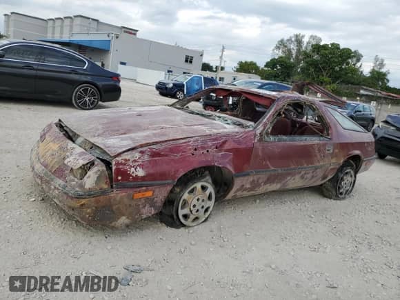 1988 Dodge Daytona with VIN 1B3CA44K0JG328039, listed as a Copart auction lot 80915124 with Not provided miles and Non repairable. Bid and sale history available at DreamBid. Image 1.