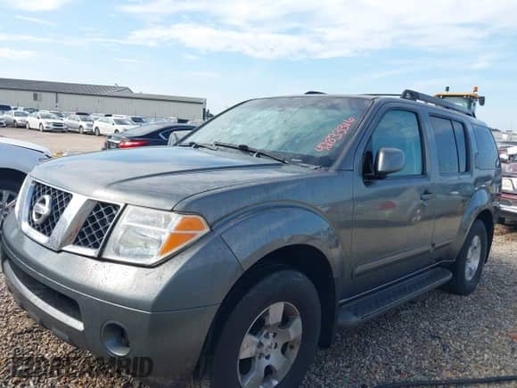 2007 Nissan Pathfinder S with VIN 5N1AR18U17C605771, listed as a IAAI auction lot 42833316 with 230,798 mi miles and . Bid and sale history available at DreamBid. Image 2.