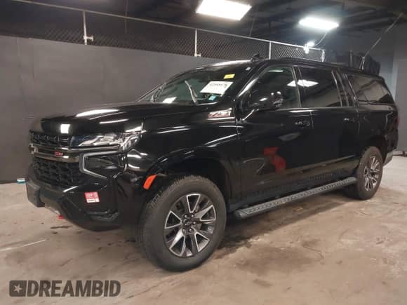 2021 Chevrolet Suburban Z71 with VIN 1GNSKDKD3MR140935, listed as a IAAI auction lot 42345178 with 52,370 mi miles and . Bid and sale history available at DreamBid. Image 2.