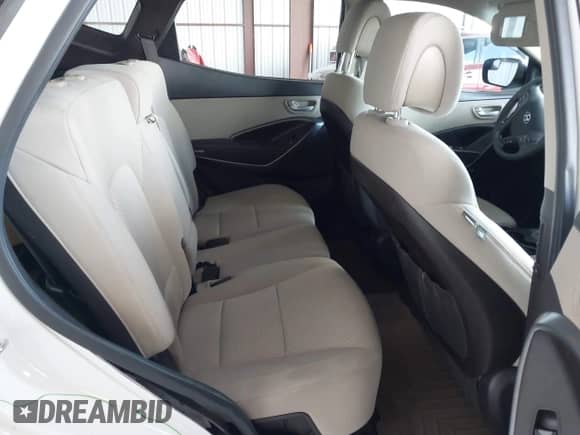 2018 Hyundai Santa Fe 2.4L z VIN 5XYZT3LB5JG516329, wystawiony jako IAAI lot #43392532 z przebiegiem 94 128 mil mil oraz . Historia ofert i sprzedaży dostępna na DreamBid. Obrazek 8.