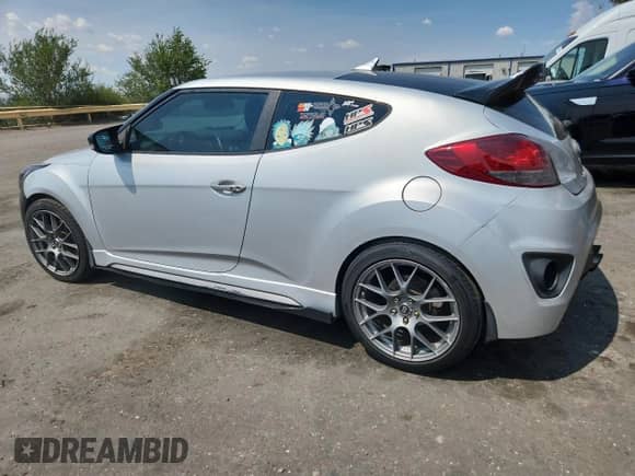 2013 Hyundai Veloster Turbo с VIN KMHTC6AE5DU169202, выставлен на аукционе Copart как лот 69867375 с пробегом 72 944 миль миль и Списание • Salvage title. История ставок и продаж доступна на DreamBid. Изображение 2.