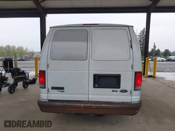 2014 Ford Econoline Cargo Commercial with VIN 1FTNS2EW6EDA03445, listed as a IAAI auction lot 41973556 with 231,391 mi miles and . Bid and sale history available at DreamBid. Image 16.