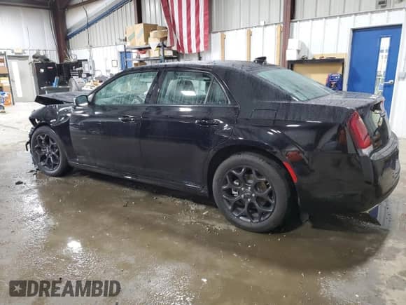 2023 Chrysler 300 Touring L with VIN 2C3CCASG6PH624691, listed as a Copart auction lot 80473464 with 9,900 mi miles and Salvage title. Bid and sale history available at DreamBid. Image 2.