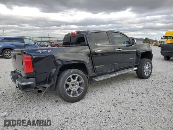 2015 Chevrolet Colorado 4WD LT с VIN 1GCGTBE30F1215837, выставлен на аукционе Copart как лот 84636715 с пробегом 85 855 миль миль и Списание • Salvage title. История ставок и продаж доступна на DreamBid. Изображение 3.