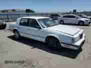 1989 Dodge Dynasty with VIN 1B3BC463XKD594439, listed as a Copart auction lot 65792195 with 61,970 mi miles and Clean title. Bid and sale history available at DreamBid. Image 4.