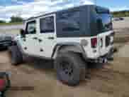 2008 Jeep Wrangler Unlimited Rubicon z VIN 1J8GA69178L531306, wystawiony jako Copart lot #84476765 z przebiegiem 111 979 mil mil oraz Szkoda całkowita • Salvage title. Historia ofert i sprzedaży dostępna na DreamBid. Obrazek 2.