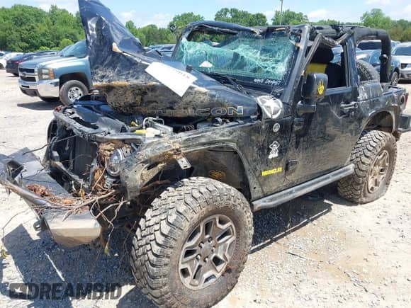 2013 Jeep Wrangler Rubicon 10th Anniversary with VIN 1C4BJWCG0DL573065, listed as a IAAI auction lot 42299018 with Not provided miles and . Bid and sale history available at DreamBid. Image 2.