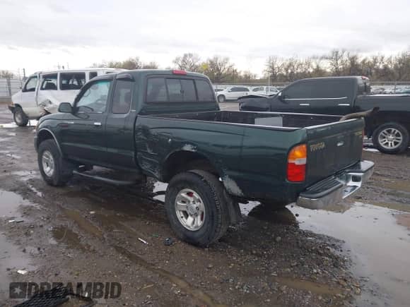 2000 Toyota Tacoma with VIN 4TAWM72N6YZ683194, listed as a IAAI auction lot 42113384 with 174,601 mi miles and . Bid and sale history available at DreamBid. Image 3.