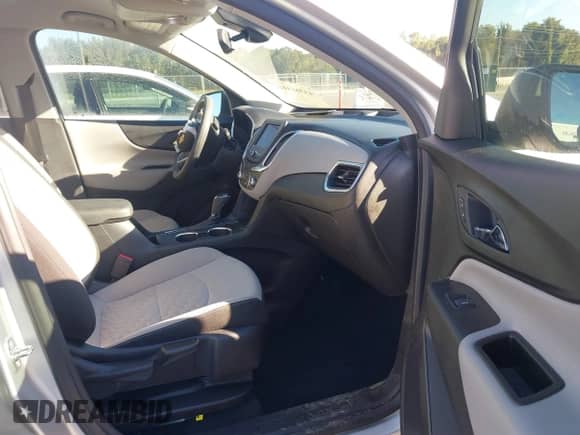 2021 Chevrolet Equinox LS z VIN 3GNAXHEV5MS125648, wystawiony jako IAAI lot #43360418 z przebiegiem 56 845 mil mil oraz . Historia ofert i sprzedaży dostępna na DreamBid. Obrazek 5.