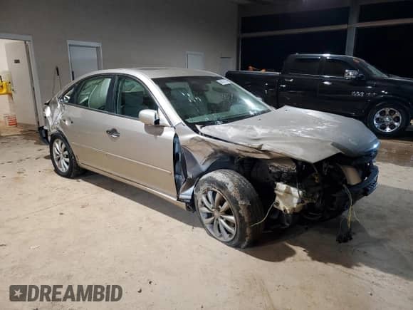 2006 Hyundai Azera SE z VIN KMHFC46F86A128070, wystawiony jako Copart lot #88057915 z przebiegiem Nie podano mil oraz Szkoda całkowita • Salvage title. Historia ofert i sprzedaży dostępna na DreamBid. Obrazek 4.