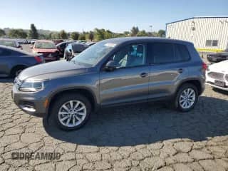 2014 Volkswagen Tiguan SEL with VIN WVGAV3AX8EW585929, listed as a Copart auction lot 61462205 with 63,899 mi miles and Salvage title. Bid and sale history available at DreamBid. Image 1.