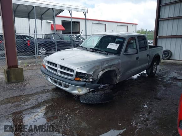 2003 Dodge Dakota Sport with VIN 1D7HG38N73S249488, listed as a IAAI auction lot 43033100 with 271,717 mi miles and . Bid and sale history available at DreamBid. Image 17.