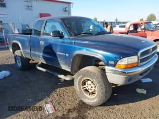 2000 Dodge Dakota Sport with VIN 1B7GG22N7YS524891, listed as a IAAI auction lot 43276185 with 194,501 mi miles and . Bid and sale history available at DreamBid. Image 1.