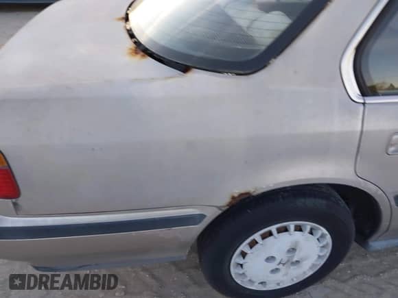 1991 Honda Accord LX z VIN JHMCB7651MC015726, wystawiony jako IAAI lot #41843620 z przebiegiem 55 563 mil mil oraz . Historia ofert i sprzedaży dostępna na DreamBid. Obrazek 15.