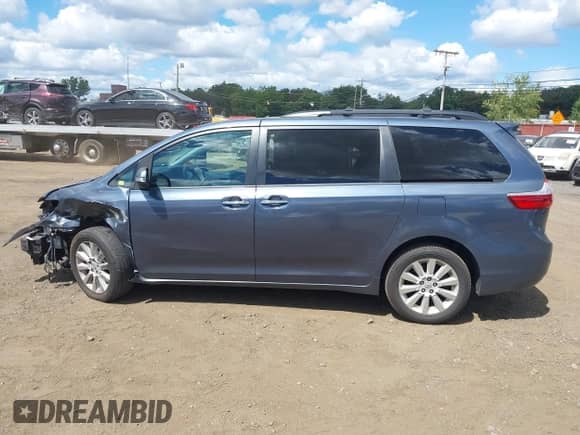 2015 Toyota Sienna Limited with VIN 5TDDK3DCXFS120752, listed as a IAAI auction lot 43095637 with 151,423 mi miles and . Bid and sale history available at DreamBid. Image 14.