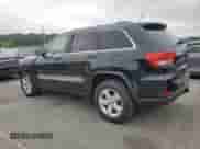2012 Jeep Grand Cherokee Laredo с VIN 1C4RJEATXCC317054, выставлен на аукционе Copart как лот 63057615 с пробегом 159 633 миль миль и Списание • Salvage title. История ставок и продаж доступна на DreamBid. Изображение 2.