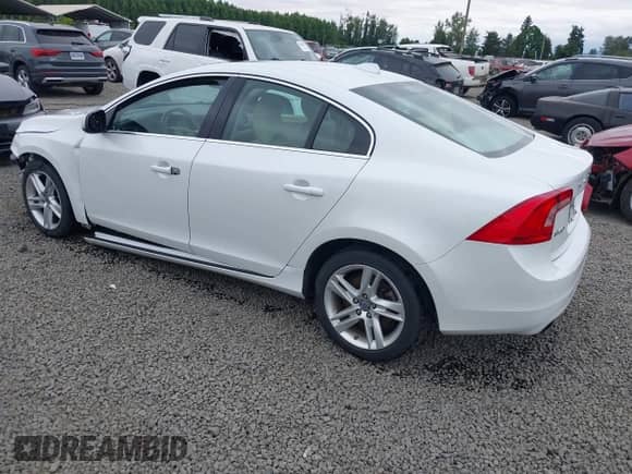 2015 Volvo S60 T5 Drive-E Premier with VIN YV140MFK2F2339819, listed as a IAAI auction lot 42651504 with 127,550 mi miles and . Bid and sale history available at DreamBid. Image 3.