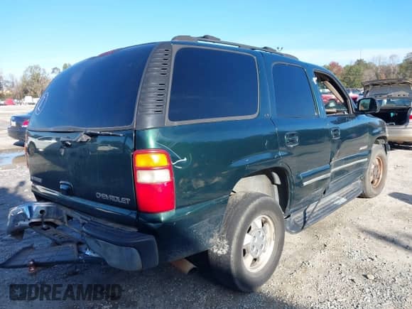 2003 Chevrolet Tahoe LS with VIN 1GNEC13ZX3J126658, listed as a IAAI auction lot 38183198 with 451,578 mi miles and . Bid and sale history available at DreamBid. Image 4.