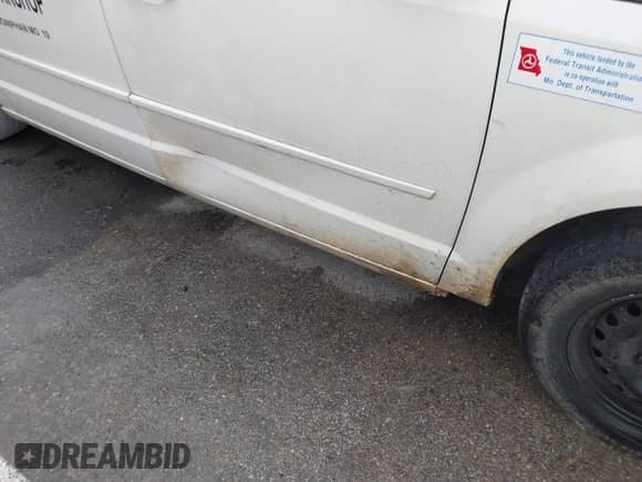 2011 Dodge Grand Caravan Express with VIN 2D4RN4DG2BR795636, listed as a IAAI auction lot 41476428 with 157,921 mi miles and . Bid and sale history available at DreamBid. Image 12.