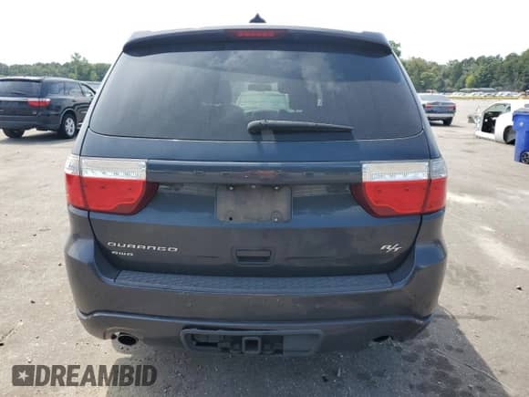 2013 Dodge Durango R/T with VIN 1C4SDJCTXDC674489, listed as a Copart auction lot 70504985 with 237,923 mi miles and Salvage title. Bid and sale history available at DreamBid. Image 6.