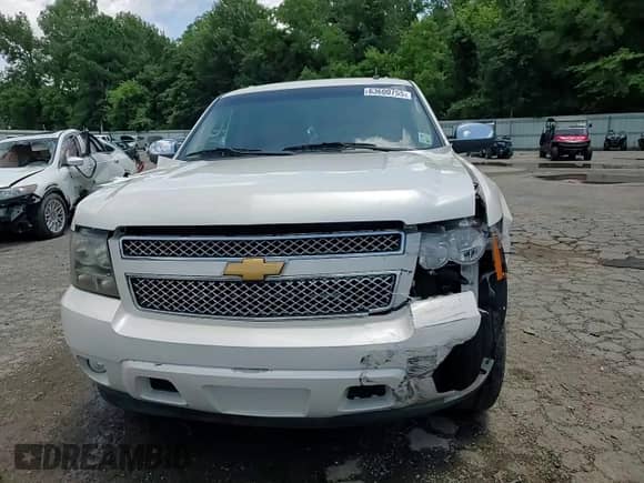 2011 Chevrolet Suburban LTZ with VIN 1GNSCKE09BR142860, listed as a Copart auction lot 63600755 with 189,899 mi miles and Salvage title. Bid and sale history available at DreamBid. Image 14.