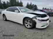 2018 Dodge Charger SXT Plus with VIN 2C3CDXHGXJH176339, listed as a Copart auction lot 82570735 with 74,483 mi miles and Salvage title. Bid and sale history available at DreamBid. Image 4.