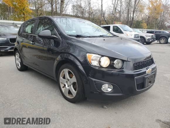 2015 Chevrolet Sonic LTZ with VIN 1G1JE6SB8F4139388, listed as a Copart auction lot 91248555 with 103,746 mi miles and Clean title. Bid and sale history available at DreamBid. Image 4.