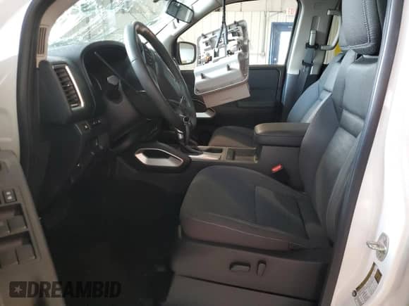 2023 Nissan Frontier SV with VIN 1N6ED1FK3PN616701, listed as a Copart auction lot 71618784 with 21,347 mi miles and Salvage title. Bid and sale history available at DreamBid. Image 7.