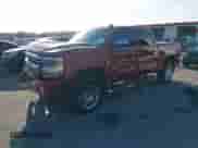 2018 Chevrolet Silverado 1500 High Country with VIN 3GCUKTEJ9JG135943, listed as a IAAI auction lot 41641275 with 83,361 mi miles and . Bid and sale history available at DreamBid. Image 2.