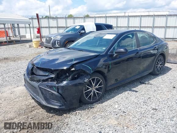 2021 Toyota Camry SE with VIN 4T1G11AK5MU404407, listed as a IAAI auction lot 42997960 with 155,618 mi miles and . Bid and sale history available at DreamBid. Image 2.