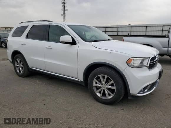 2016 Dodge Durango Limited with VIN 1C4RDHDGXGC402926, listed as a Copart auction lot 81308245 with 228,221 mi miles and Salvage title. Bid and sale history available at DreamBid. Image 4.