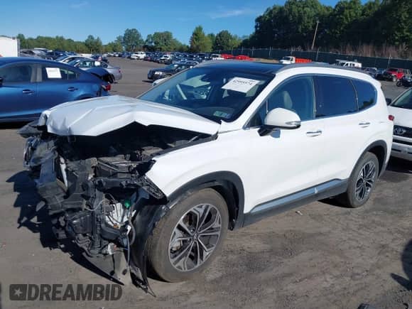 2019 Hyundai Santa Fe Ultimate с VIN 5NMS5CAA1KH012731, выставлен на аукционе IAAI как лот 42995574 с пробегом 101 714 миль миль и . История ставок и продаж доступна на DreamBid. Изображение 2.